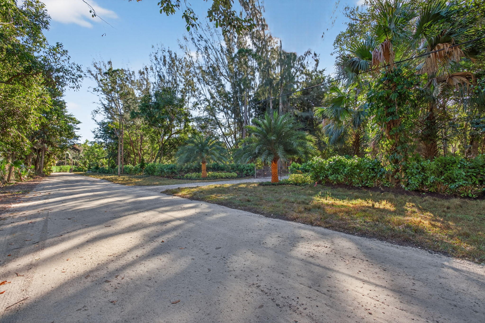 9620 171st Street North Jupiter, FL 33478 - Photo 22 of 23 a view of a yard with basketball court