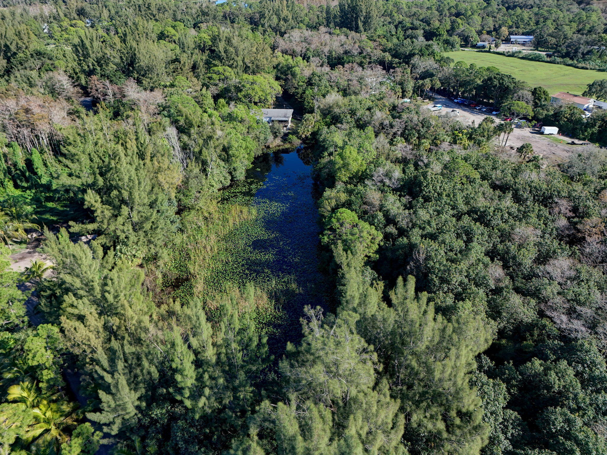 9620 171st Street North Jupiter, FL 33478 - Photo 4 of 23 an aerial view of a house with a yard