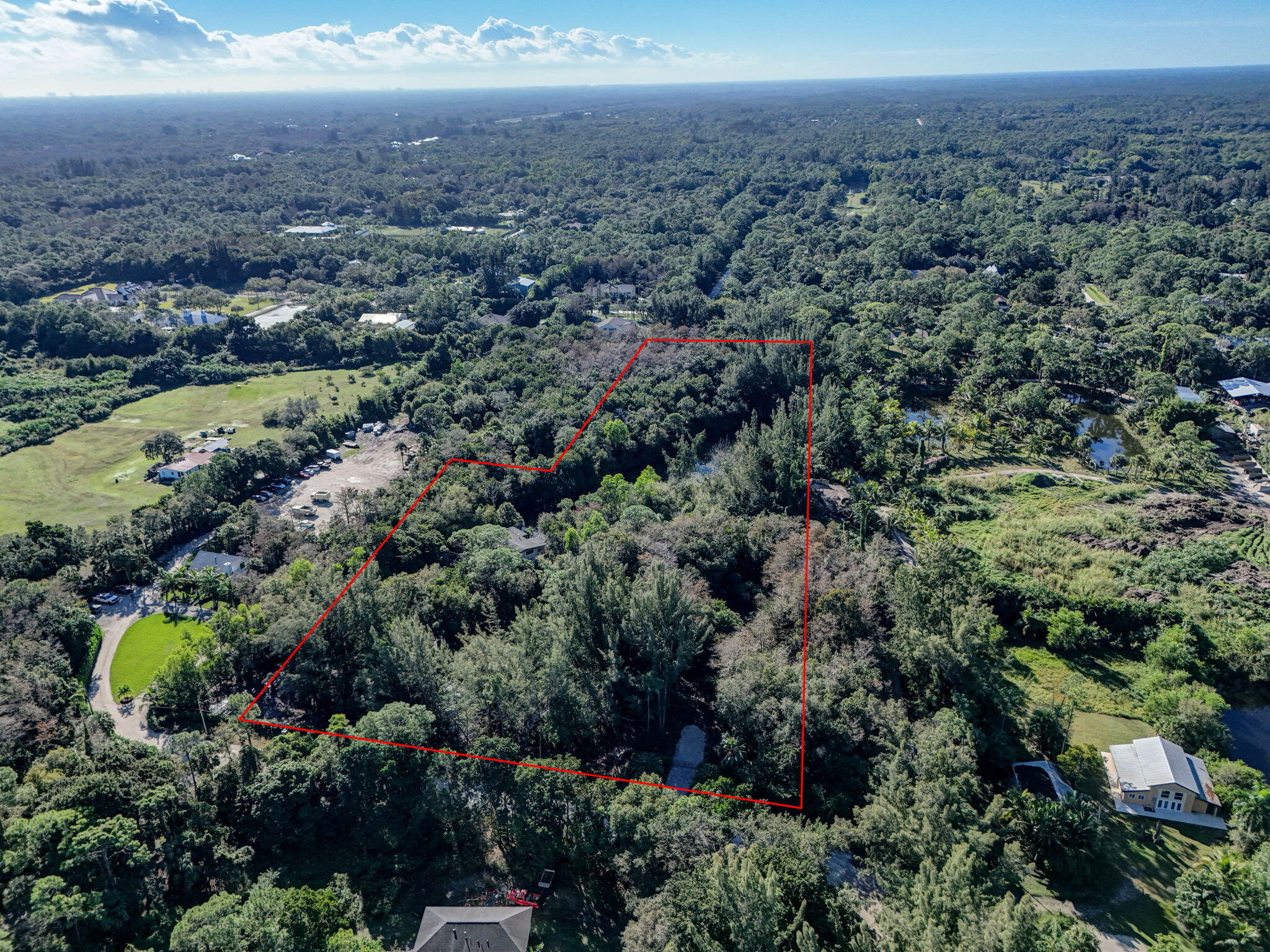 9620 171st Street North Jupiter, FL 33478 - Photo 8 of 23 an aerial view of multiple house