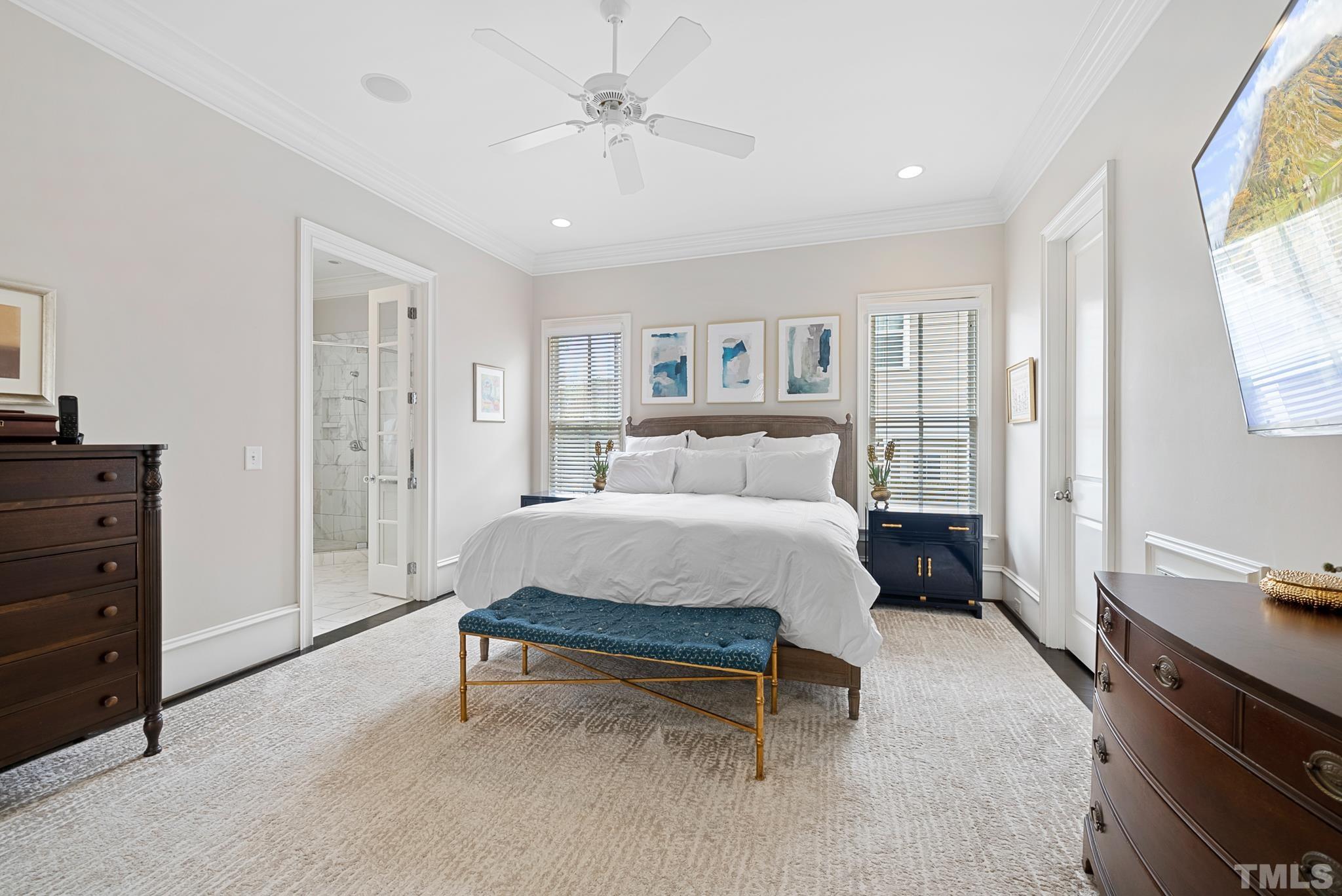 2615 Davis Street Raleigh, NC 27608 - Photo 30 of 55 a spacious bedroom with a bed and a window