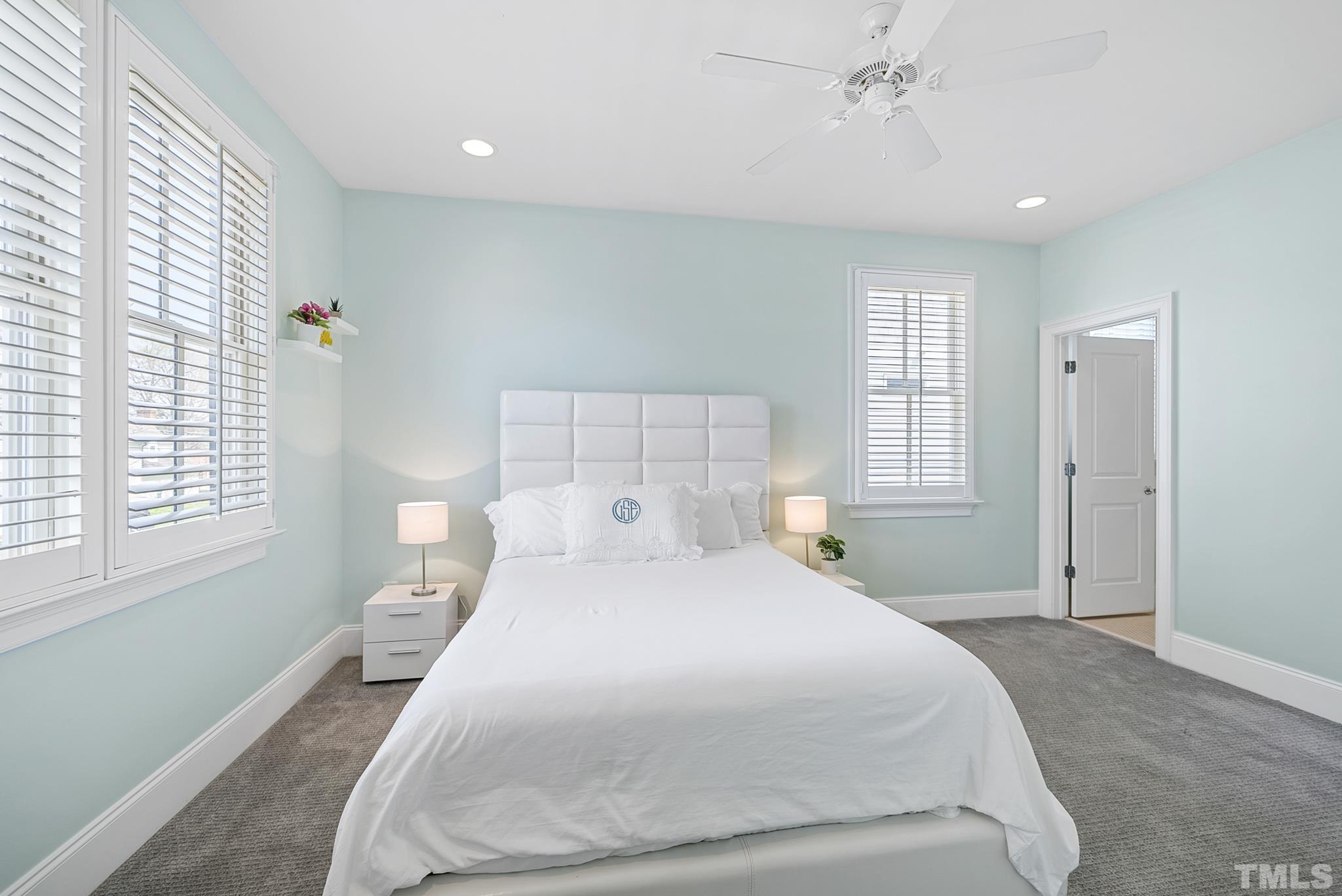 2615 Davis Street Raleigh, NC 27608 - Photo 36 of 55 a bedroom with a bed and a window