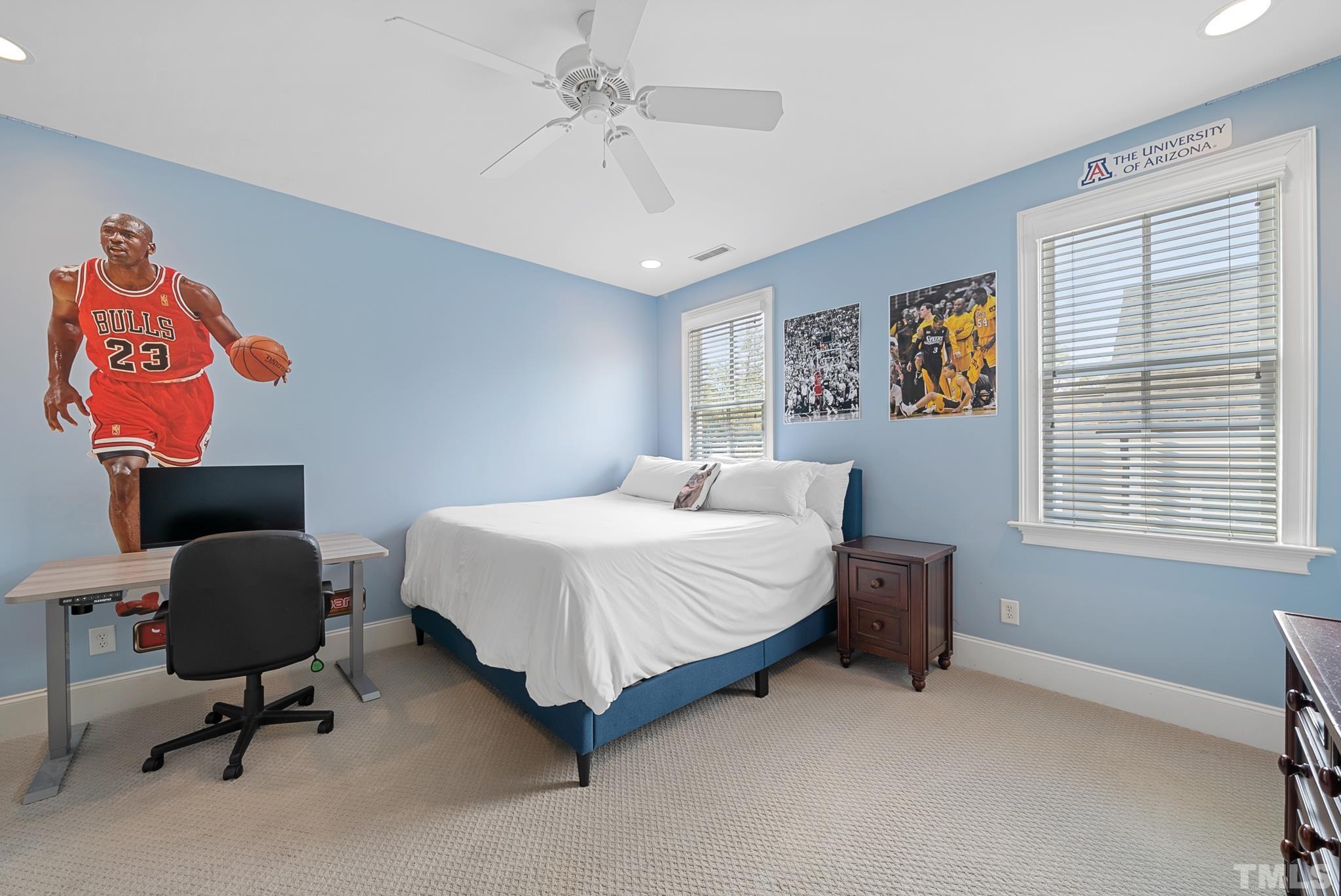 2615 Davis Street Raleigh, NC 27608 - Photo 45 of 55 a bedroom with a bed a computer on the desk and chair