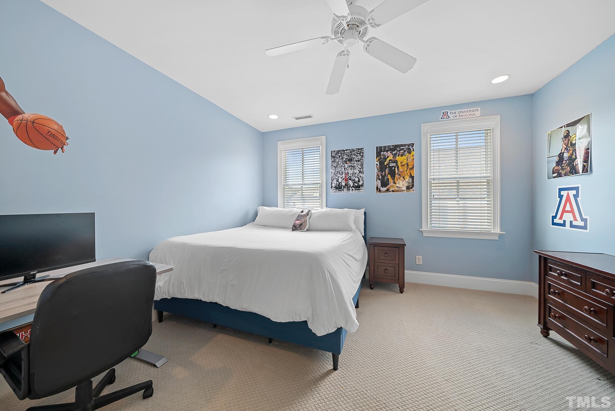 2615 Davis Street Raleigh, NC 27608 - Photo 46 of 55 a bedroom with a bed and a television