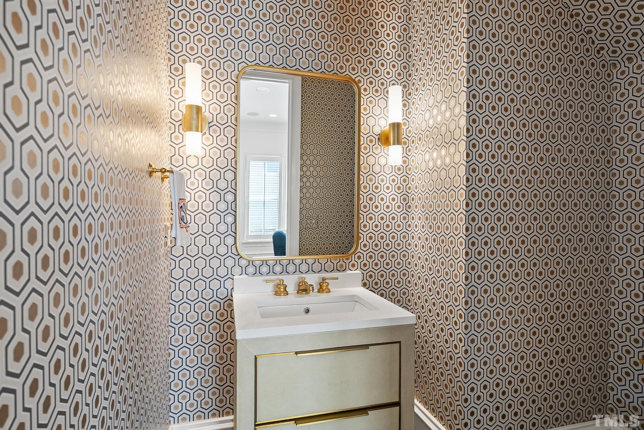 2615 Davis Street Raleigh, NC 27608 - Photo 53 of 55 a bathroom with a sink and mirror