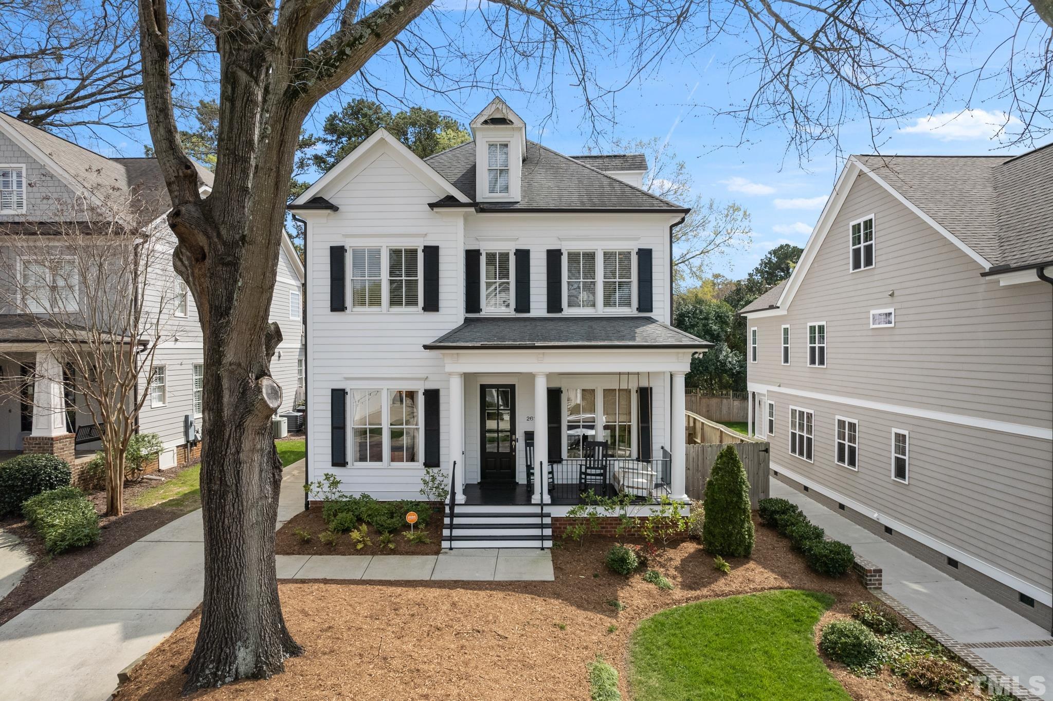 2615 Davis Street Raleigh, NC 27608 - Photo 55 of 55 a front view of a house with garden
