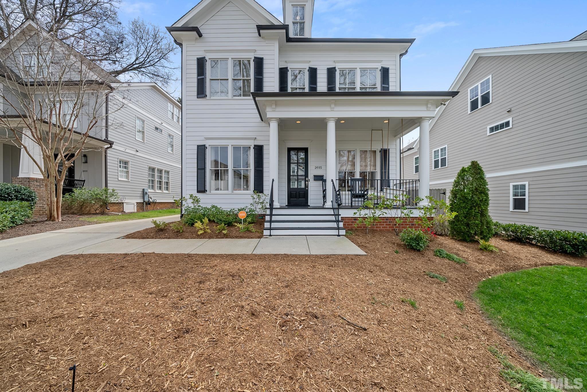 2615 Davis Street Raleigh, NC 27608 - Photo 6 of 55 front view of a house with a yard