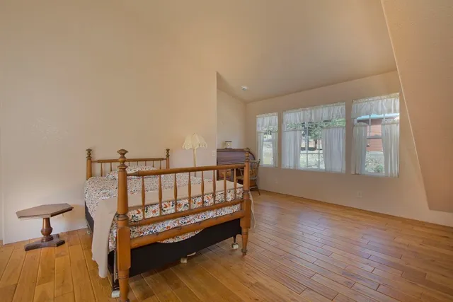 a view of livingroom with furniture and a window
