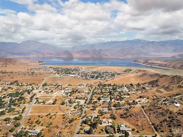 an aerial view of beach and city