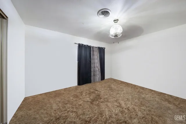 a view of a room with an empty space