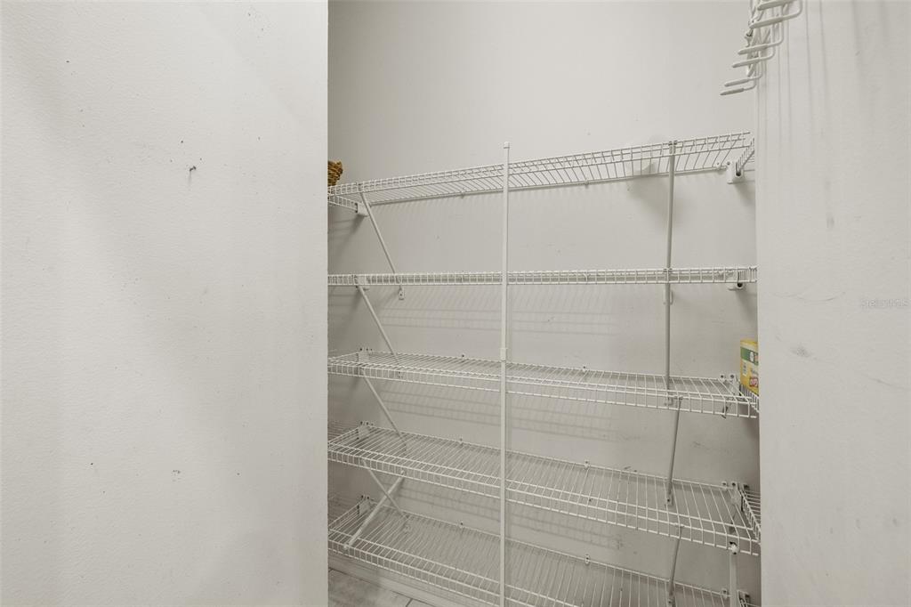 4906 Willow Ridge Terrace Valrico, FL 33596 - Photo 18 of 67 a bathroom with a glass shower door