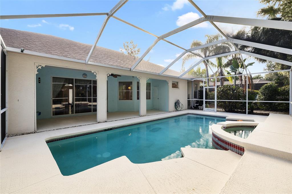 4906 Willow Ridge Terrace Valrico, FL 33596 - Photo 36 of 67 a view of a white building and couches in the patio