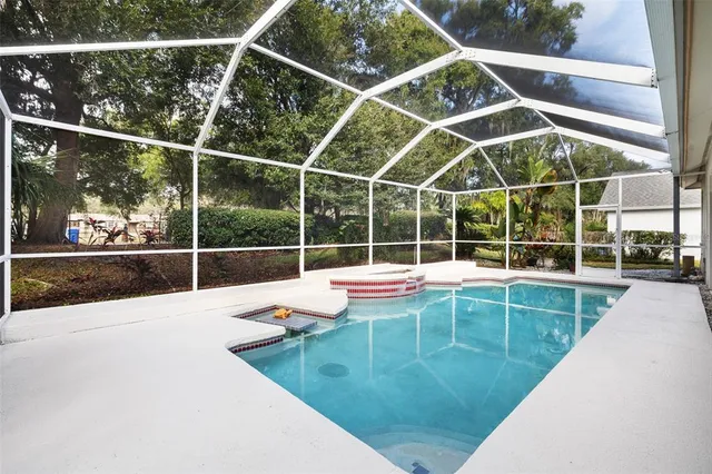 a utility room with sink dryer and washer