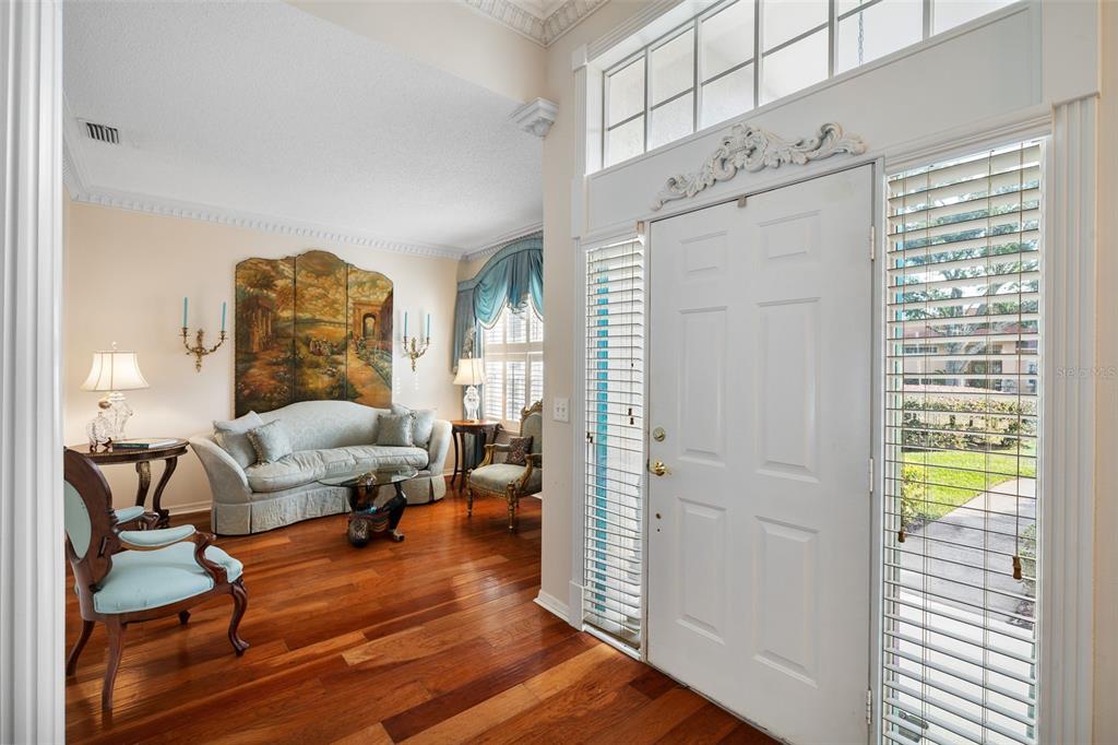 4906 Willow Ridge Terrace Valrico, FL 33596 - Photo 4 of 67 a living room with furniture and wooden floor