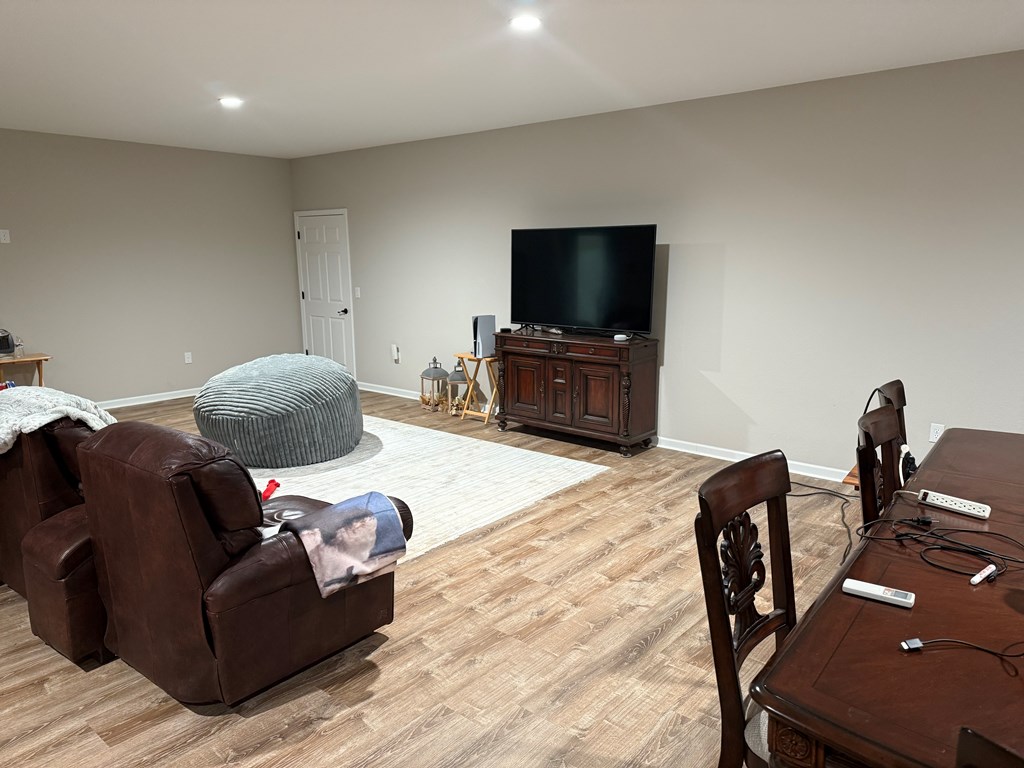 3530 Grape Creek Road Murphy, NC 28906 - Photo 18 of 53 a living room with furniture and a flat screen tv