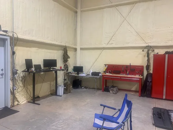 a view of house with a street