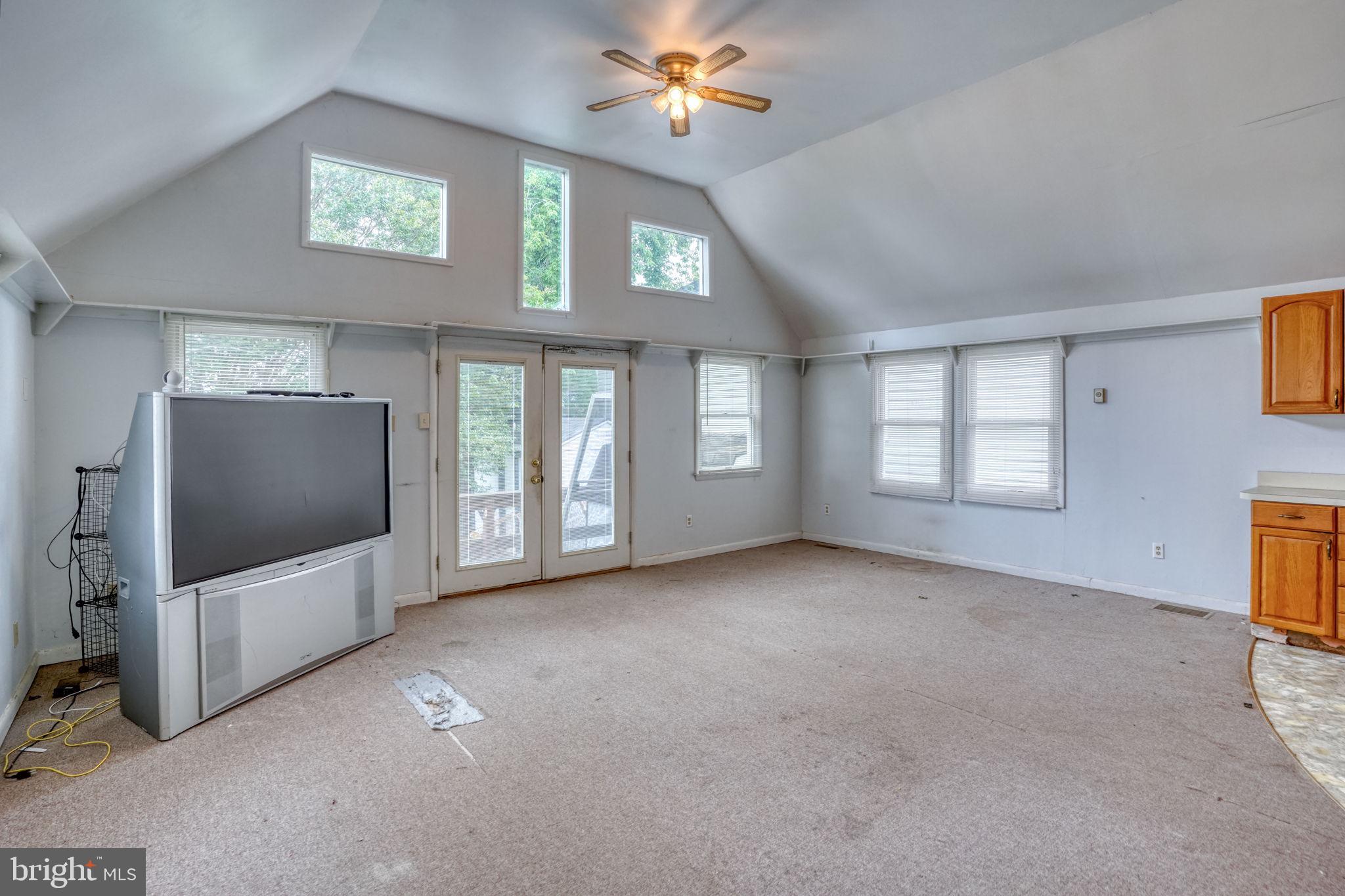 257 Front Street Leipsic, DE 19901 - Photo 13 of 37 a view of livingroom with hardwood floor and window