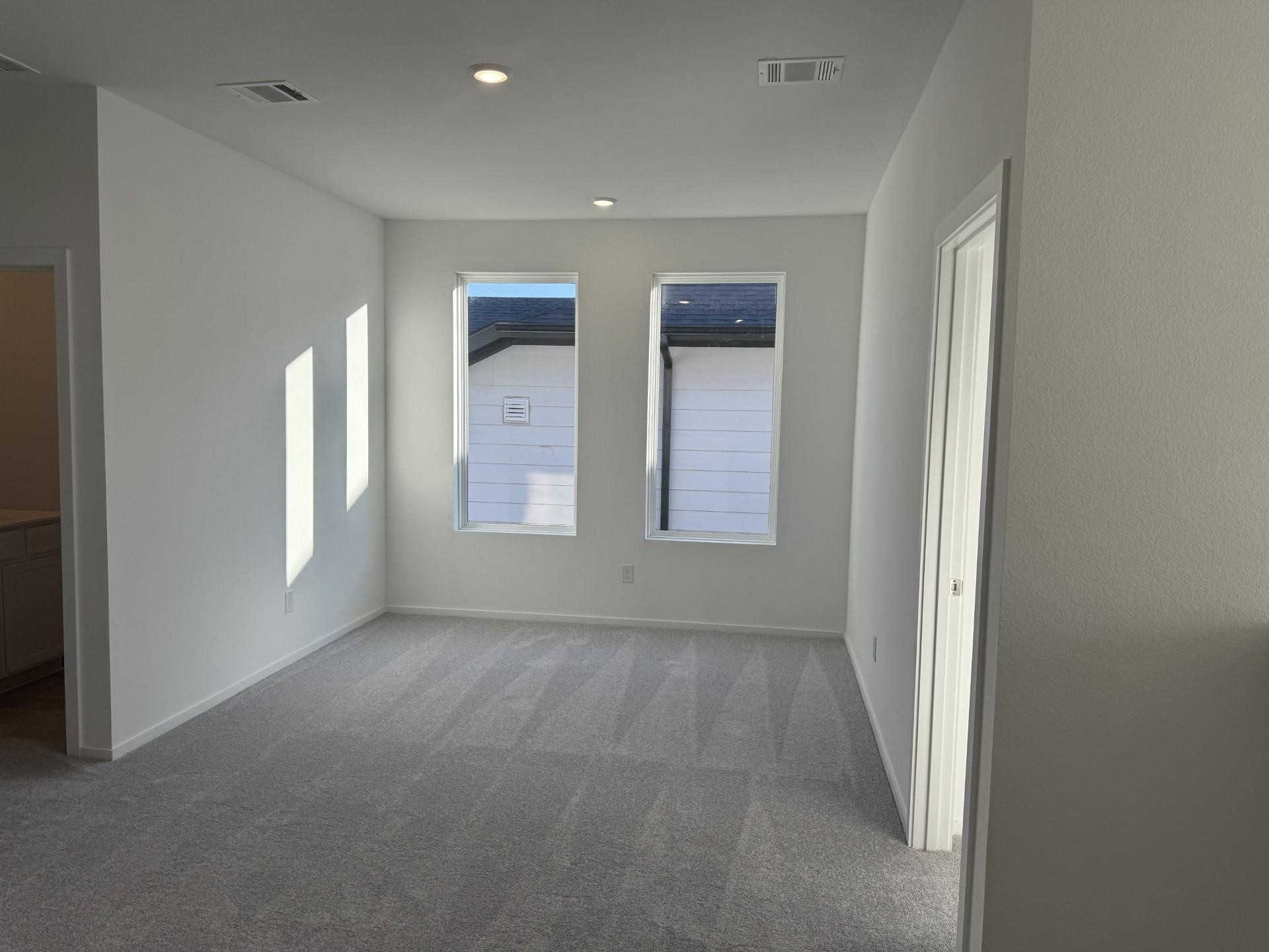 2719 Grove Crest Drive Rosenberg, TX 77469 - Photo 6 of 14 a view of an empty room with a window