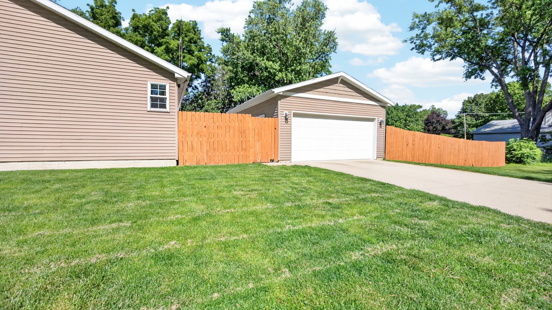 308 East Locust Street Normal, IL 61761 - Photo 35 of 40 a view of a house with a yard and a garage