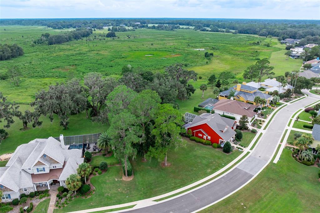 3897 Southwest 69th Avenue Gainesville, FL 32608 - Photo 16 of 20 an aerial view of residential houses with outdoor space and street view