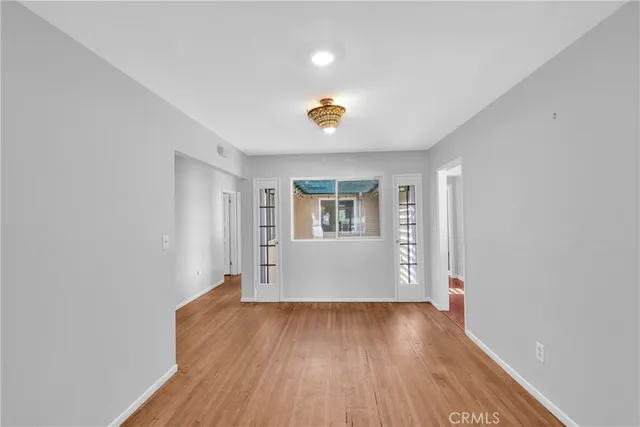 a view of an empty room and window