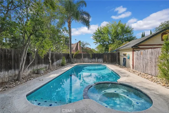 a view of a pathway of a house with a yard