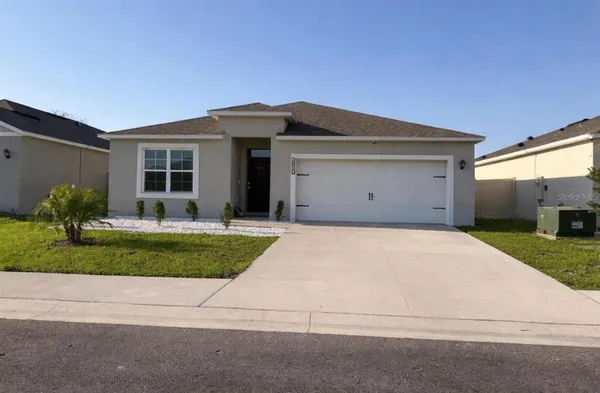a view of a house with a garage