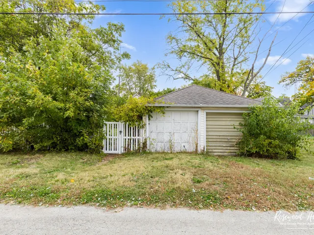 a house with trees in front of it