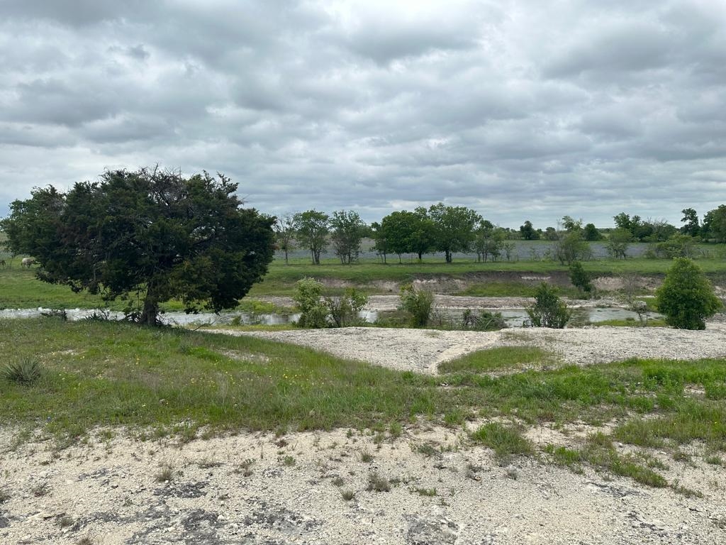 Tbd Hackberry Road Holland, TX 76534 - Photo 1 of 22 a view of a lake with a big yard