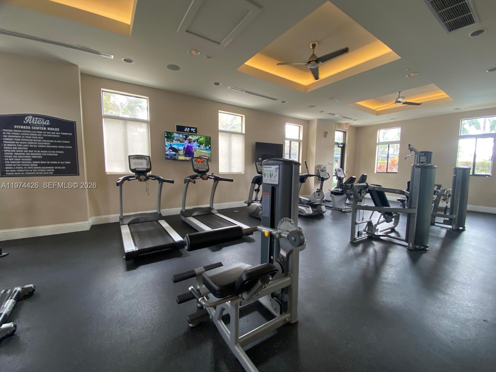 11543 Southwest 248th Lane Homestead, FL 33032 - Photo 28 of 32 a view of a room with gym equipment