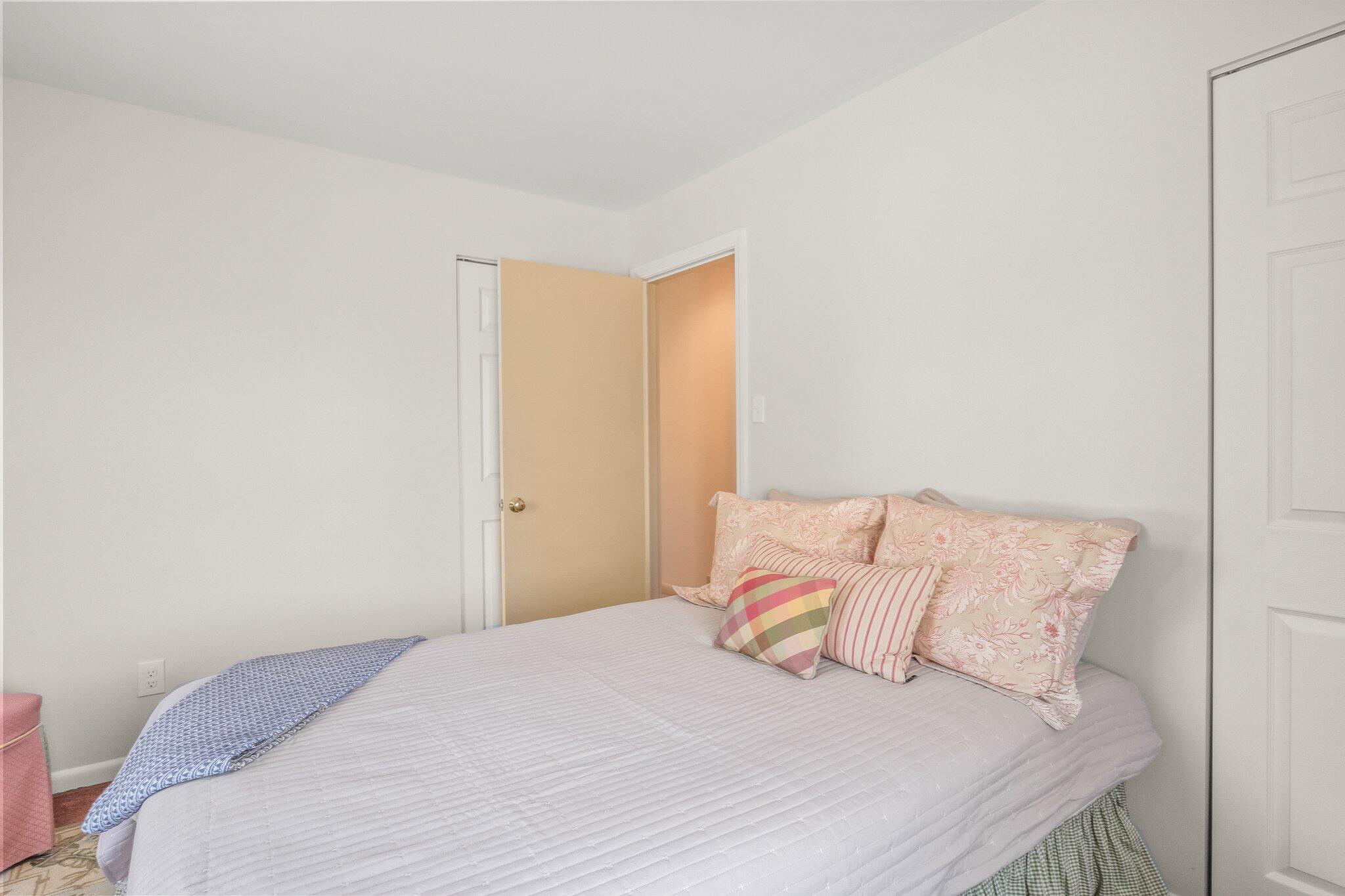 2 Long Road Harwich, MA 02645 - Photo 16 of 34 a bedroom with a bed and a night stand