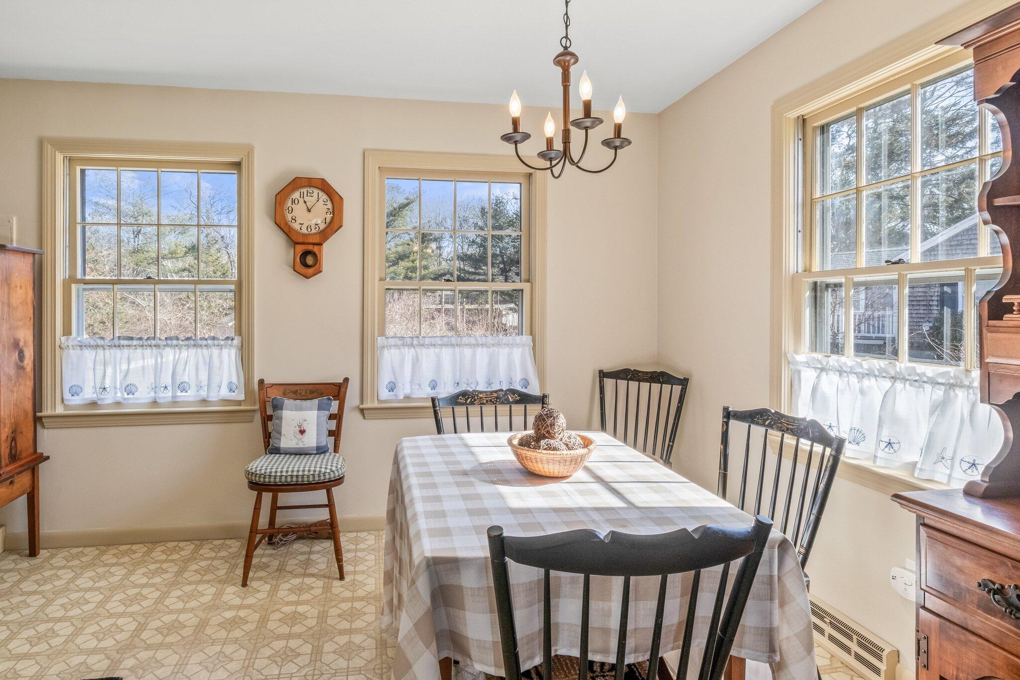 2 Long Road Harwich, MA 02645 - Photo 7 of 34 a view of a dining room with furniture window and outside view