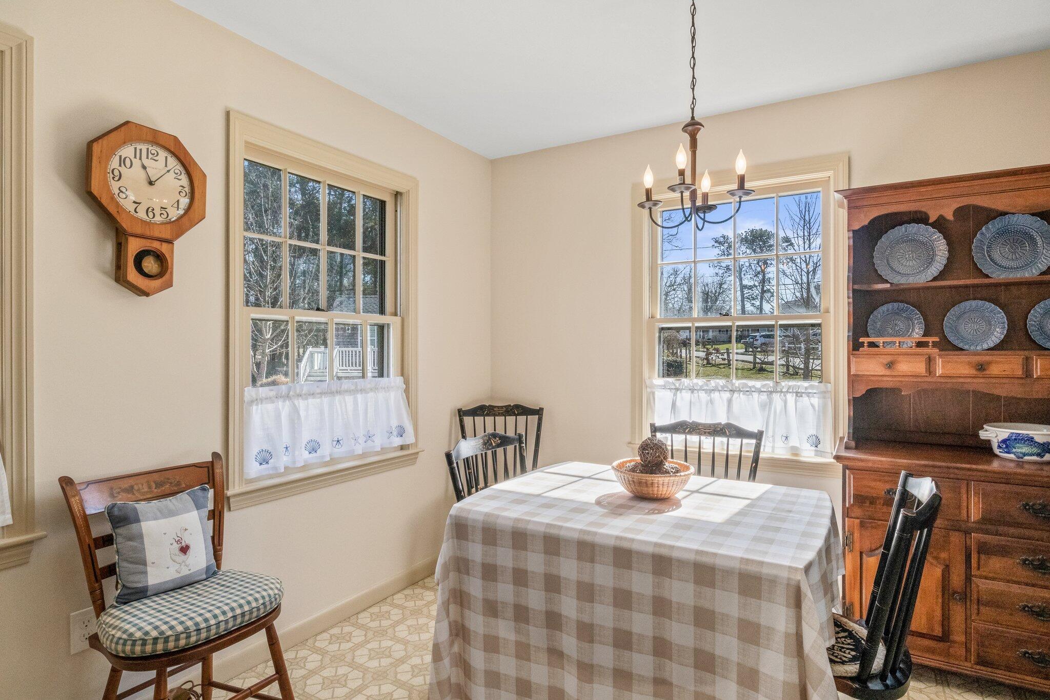 2 Long Road Harwich, MA 02645 - Photo 8 of 34 a bedroom with a bed and wooden floor