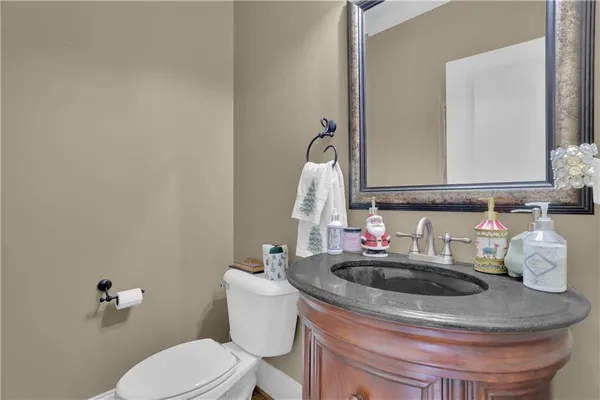 a bathroom with a sink and a toilet