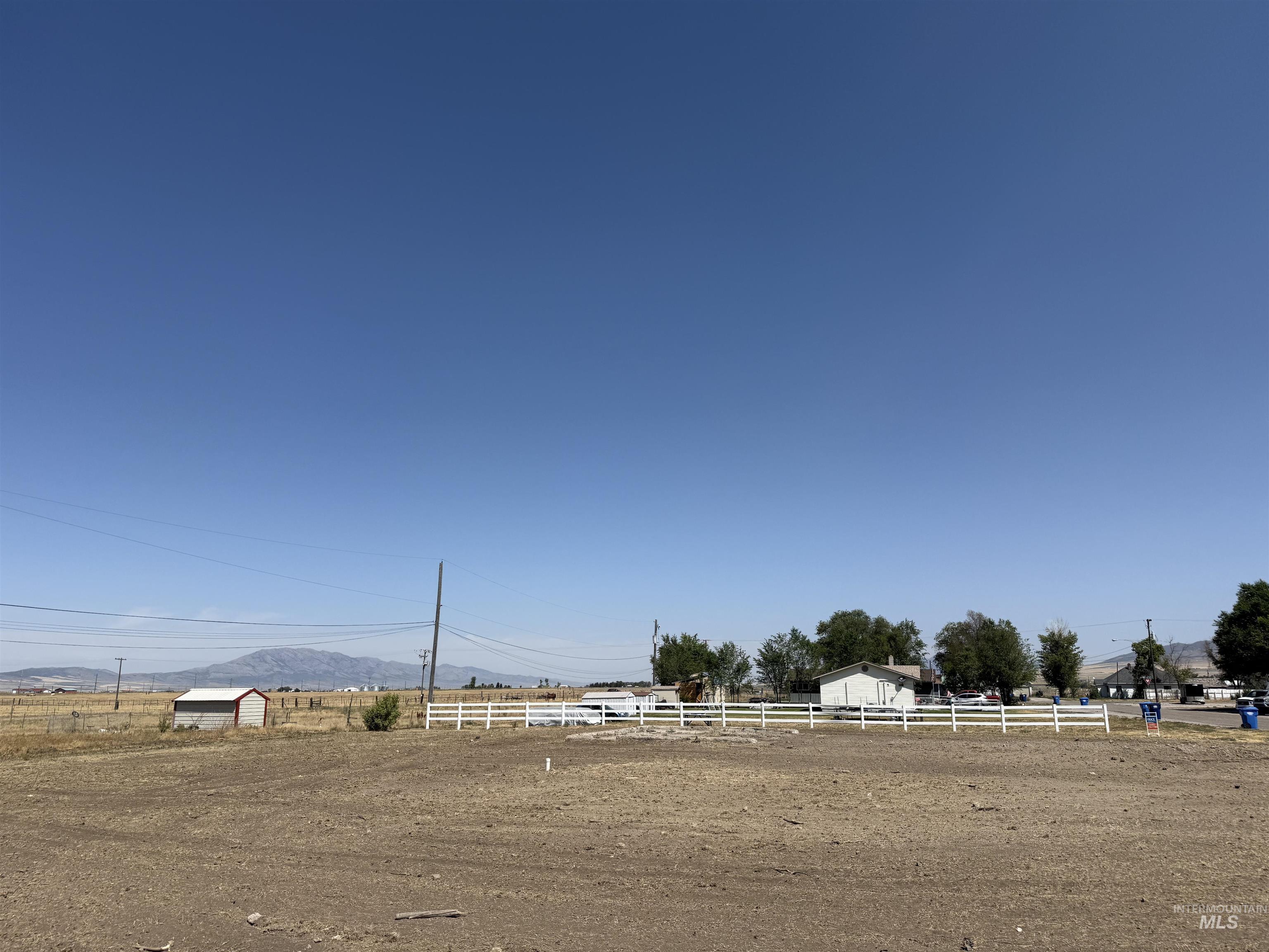 Tbd West 3rd Street North Downey, ID 83234 - Photo 2 of 3 View of yard with a mountain view, a view of rural / pastoral area, and an enclosed riding area