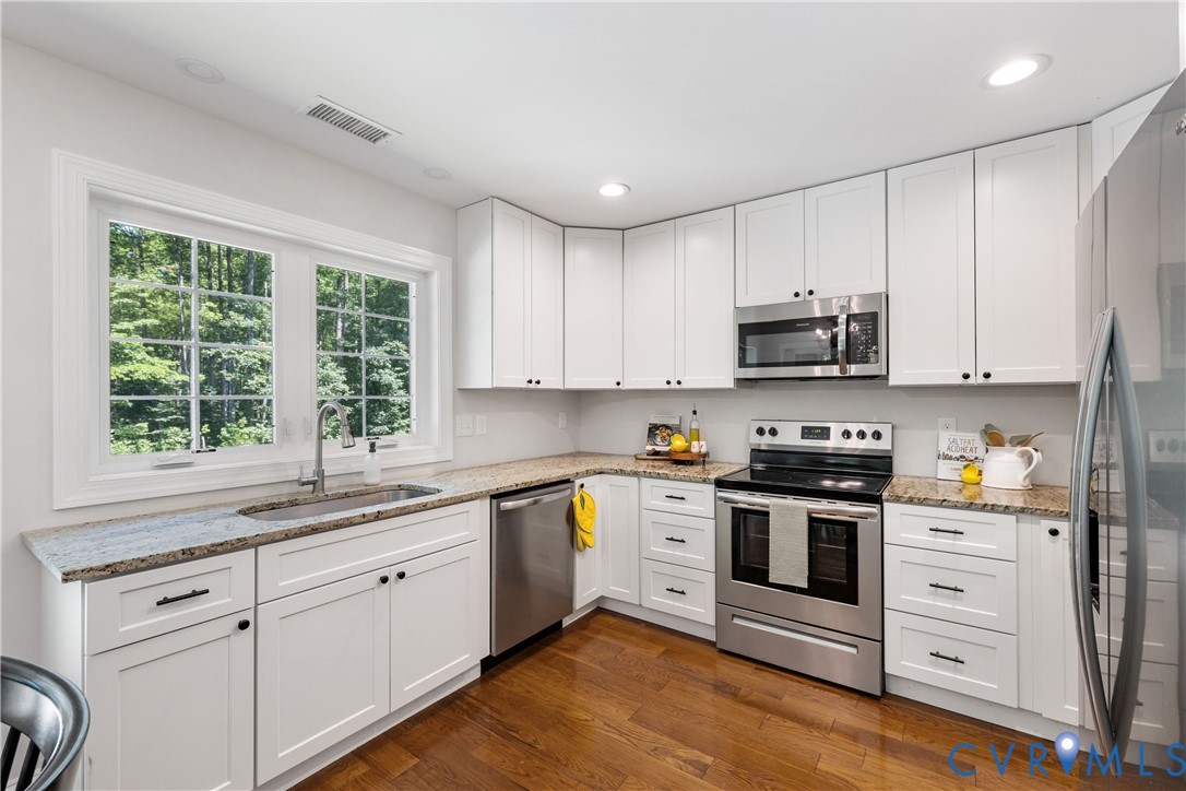 2207 Carpenters Mill Road Ruckersville, VA 22968 - Photo 11 of 34 Kitchen with stainless steel appliances, dark wood