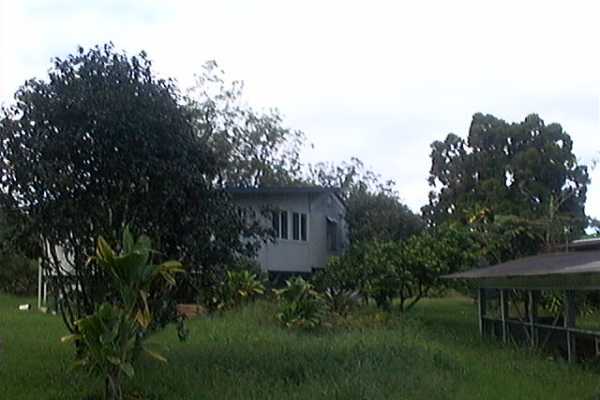 18-2505 Volcano Road Mountain View, HI 96771 - Photo 7 of 13 a view of house with outdoor space and garden