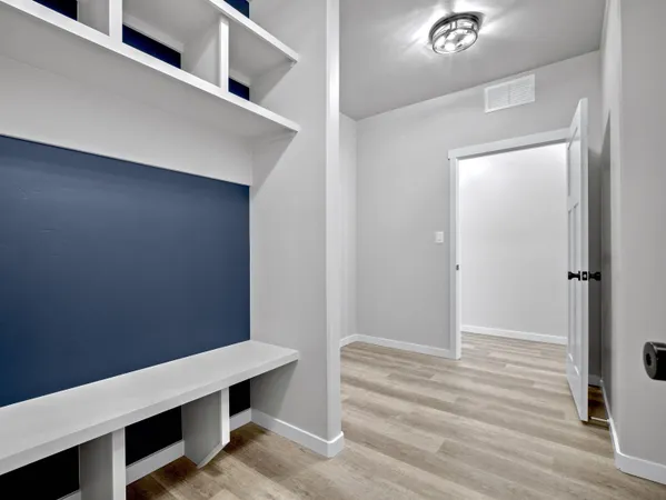 a room with table and white walls