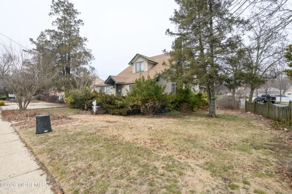a backyard of a house with lots of green space