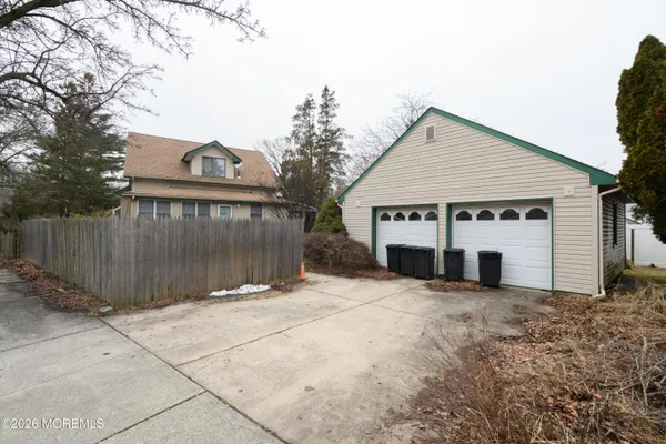 a picture of a bench in front of a wall