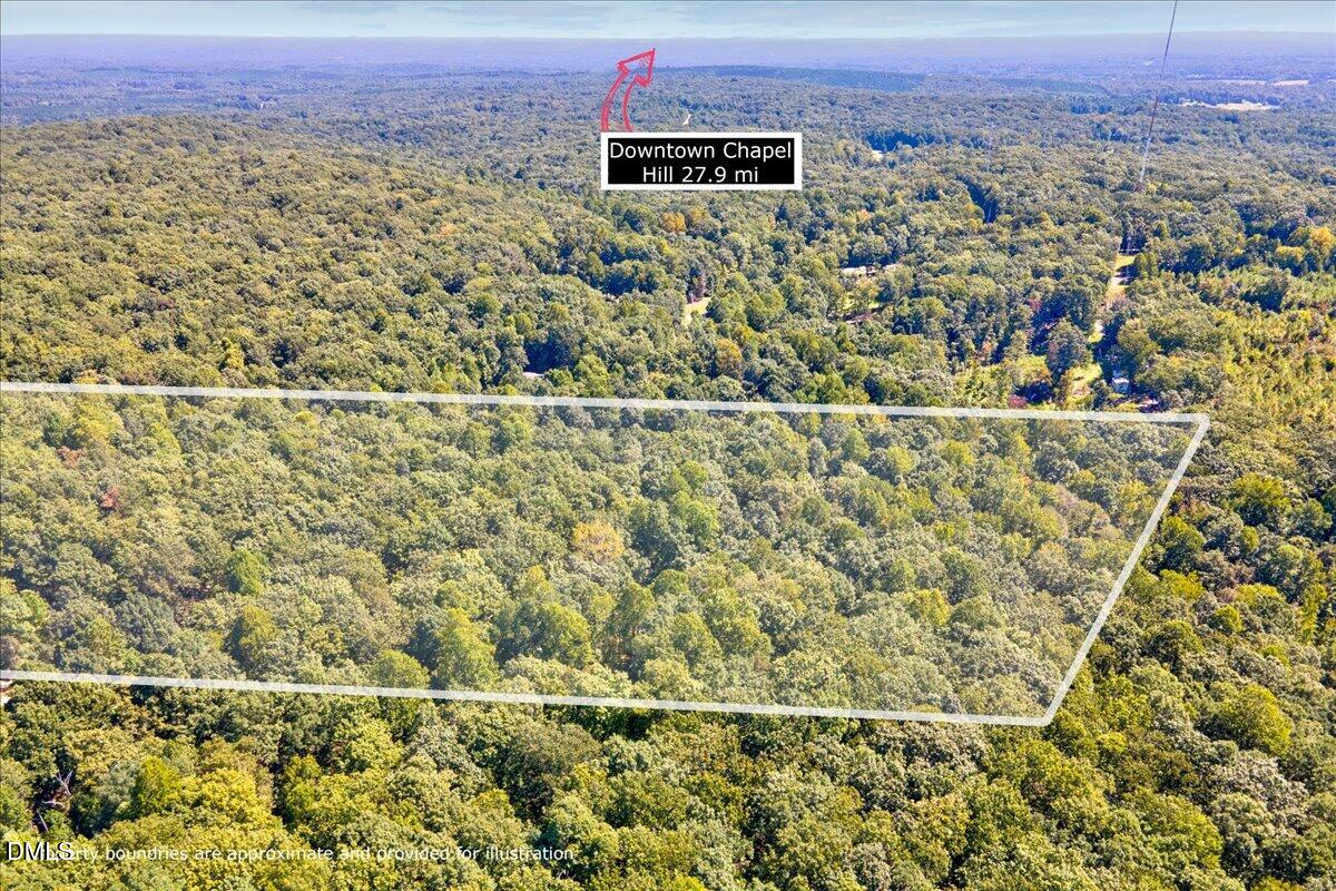 0 Boulder Road Snow Camp, NC 27349 - Photo 7 of 10 an aerial view of a residential apartment building with a yard and mountain view