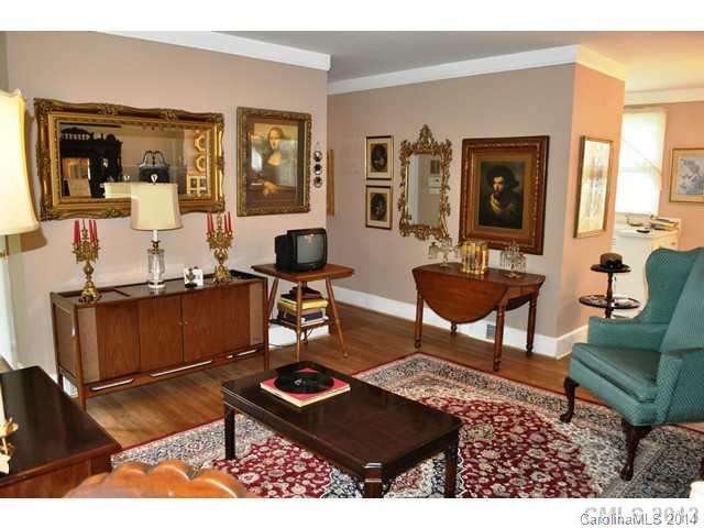 4223 Cheltenham Road, Unit 4223 Charlotte, NC 28211 - Photo 2 of 16 a living room with furniture and a rug
