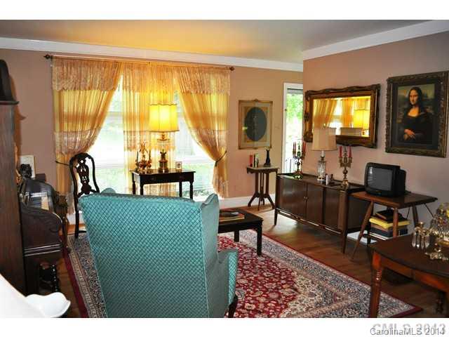 4223 Cheltenham Road, Unit 4223 Charlotte, NC 28211 - Photo 12 of 16 a living room with furniture and a window