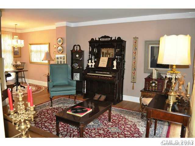 4223 Cheltenham Road, Unit 4223 Charlotte, NC 28211 - Photo 16 of 16 a living room with furniture and a fireplace