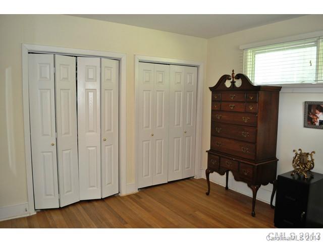 4223 Cheltenham Road, Unit 4223 Charlotte, NC 28211 - Photo 7 of 16 a living room with a dresser and a window
