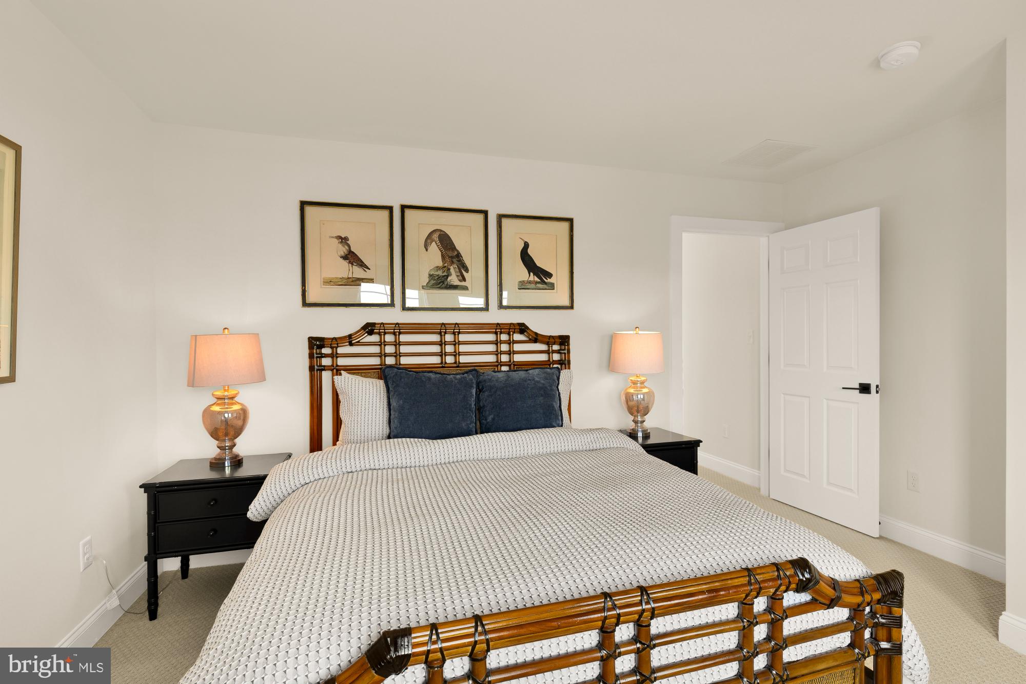 11634 Cannon Road Lewes, DE 19958 - Photo 25 of 41 a bedroom with a bed and a table in it