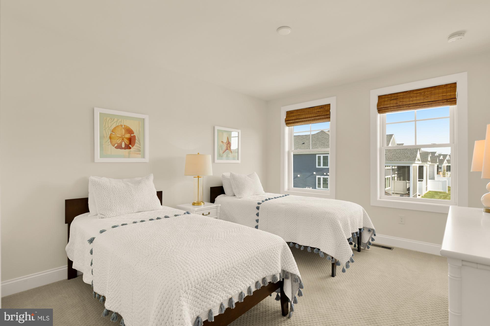 11634 Cannon Road Lewes, DE 19958 - Photo 27 of 41 a spacious bedroom with two beds and a window