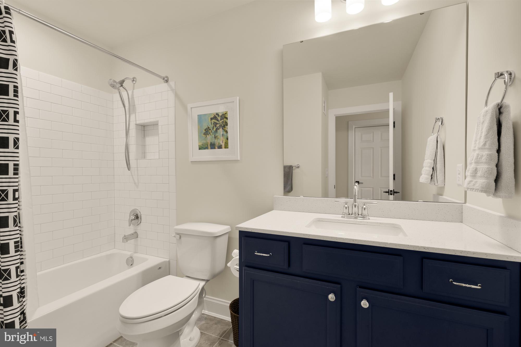11634 Cannon Road Lewes, DE 19958 - Photo 28 of 41 a bathroom with a sink a toilet and shower
