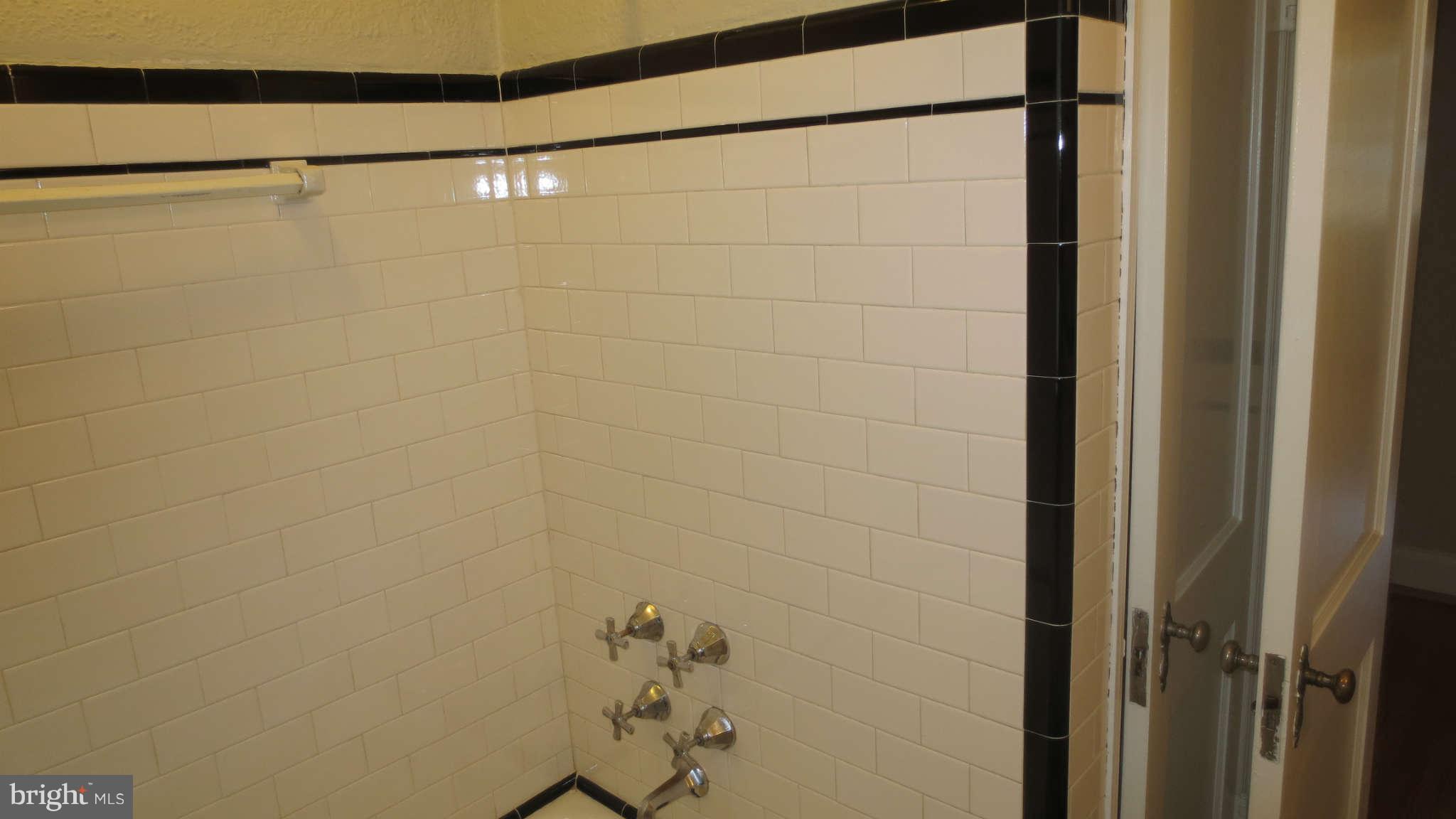 63 Murdock Road Baltimore, MD 21212 - Photo 14 of 16 a bathroom with a shower