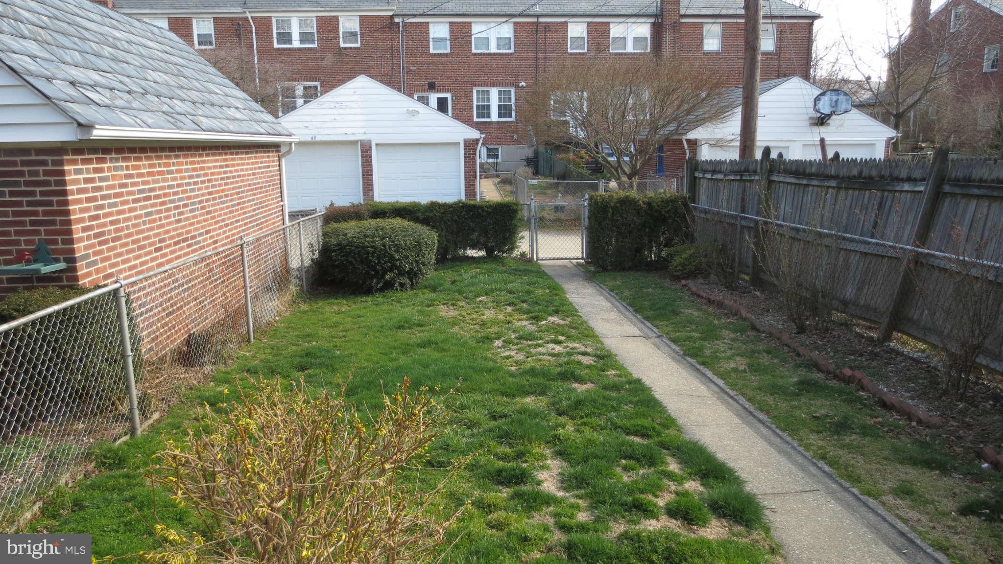 63 Murdock Road Baltimore, MD 21212 - Photo 16 of 16 a view of backyard with a tub and trees