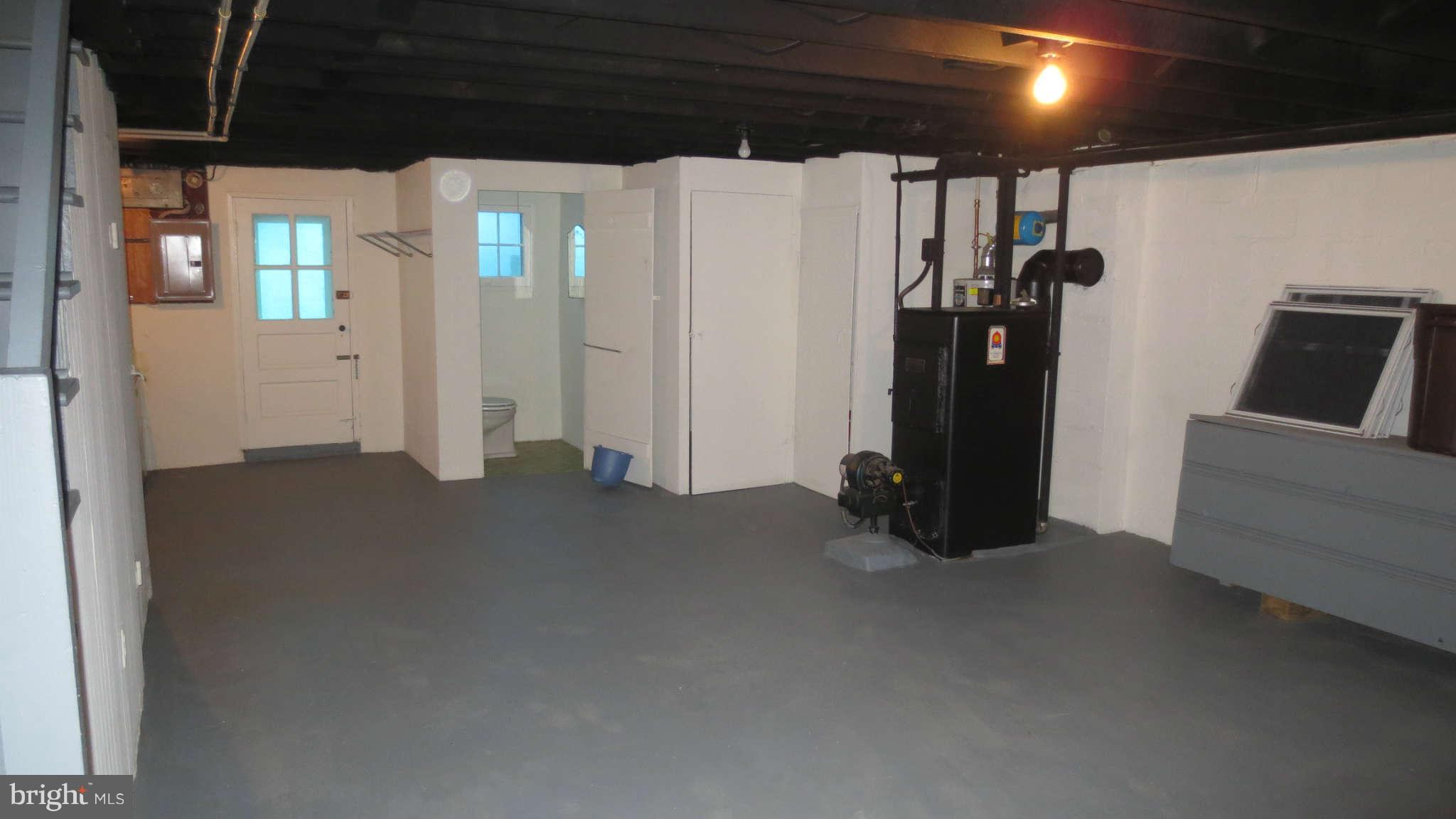 63 Murdock Road Baltimore, MD 21212 - Photo 8 of 16 wooden floor in an empty room